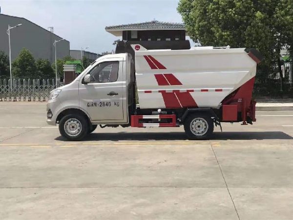 國六長(zhǎng)安3.5方后掛桶式壓縮垃圾車